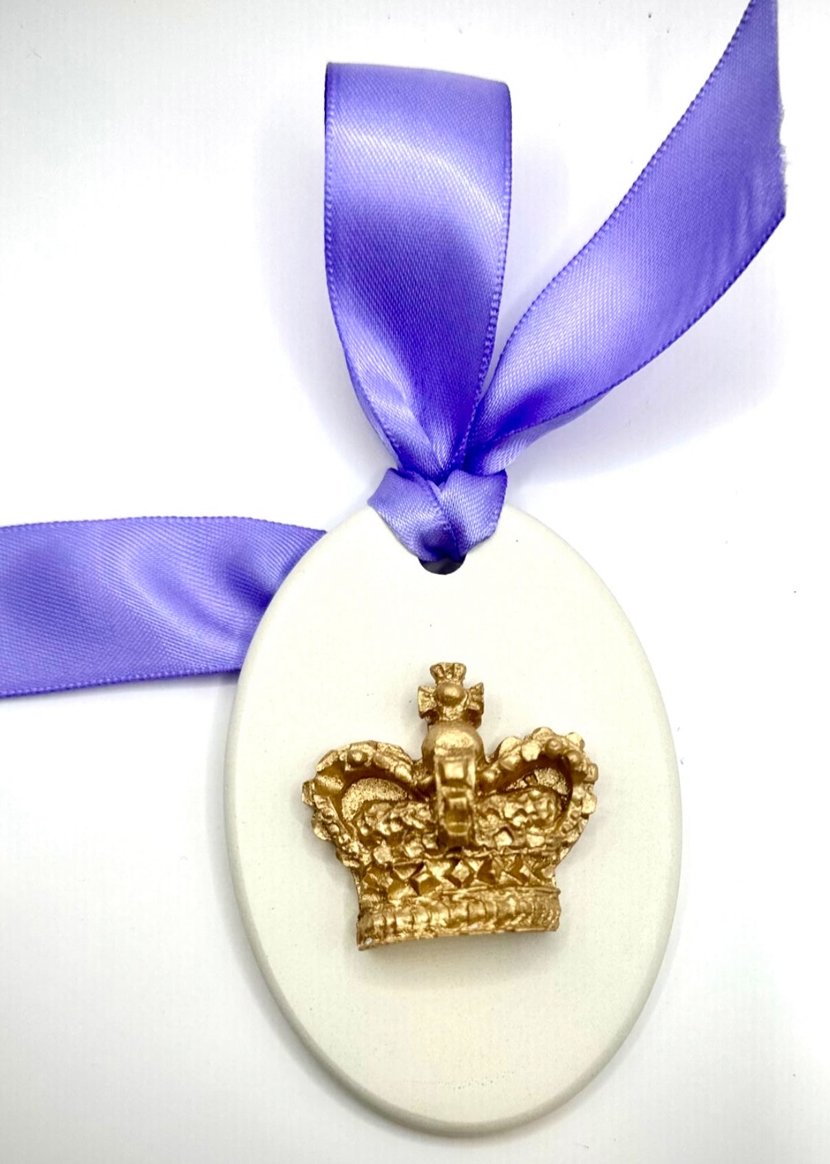 Kings crown on oval ornament